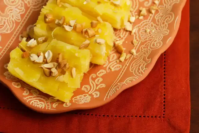 Receita de Mandioca cozida com manteiga de mel e castanha-de-caju